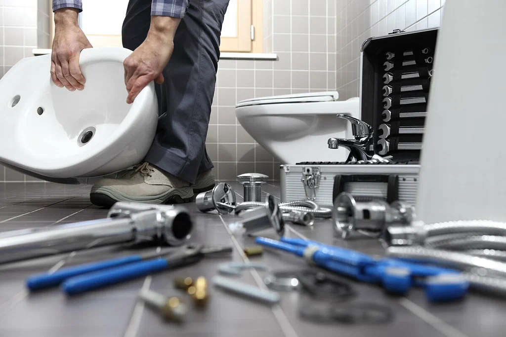 Plumbing tools prepared for a bathroom repair in Warrington