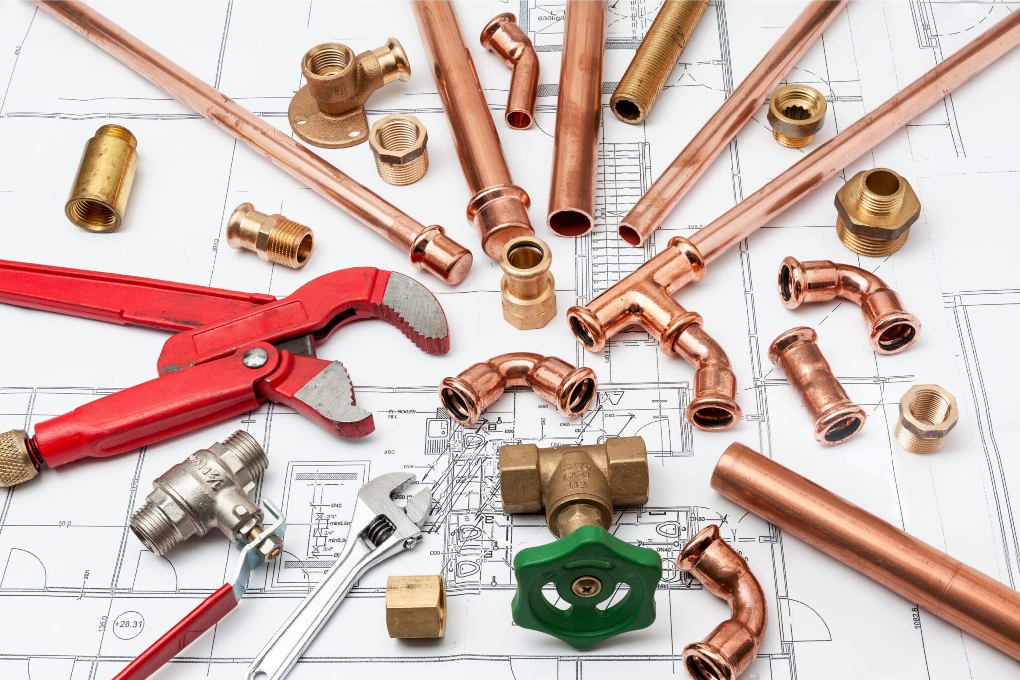 Copper pipes, fittings, valves, and plumbing tools in Warrington